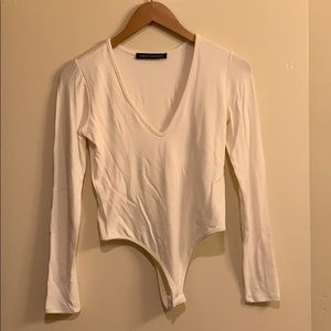 Naked Wardrobe White Long Sleeve Bodysuit